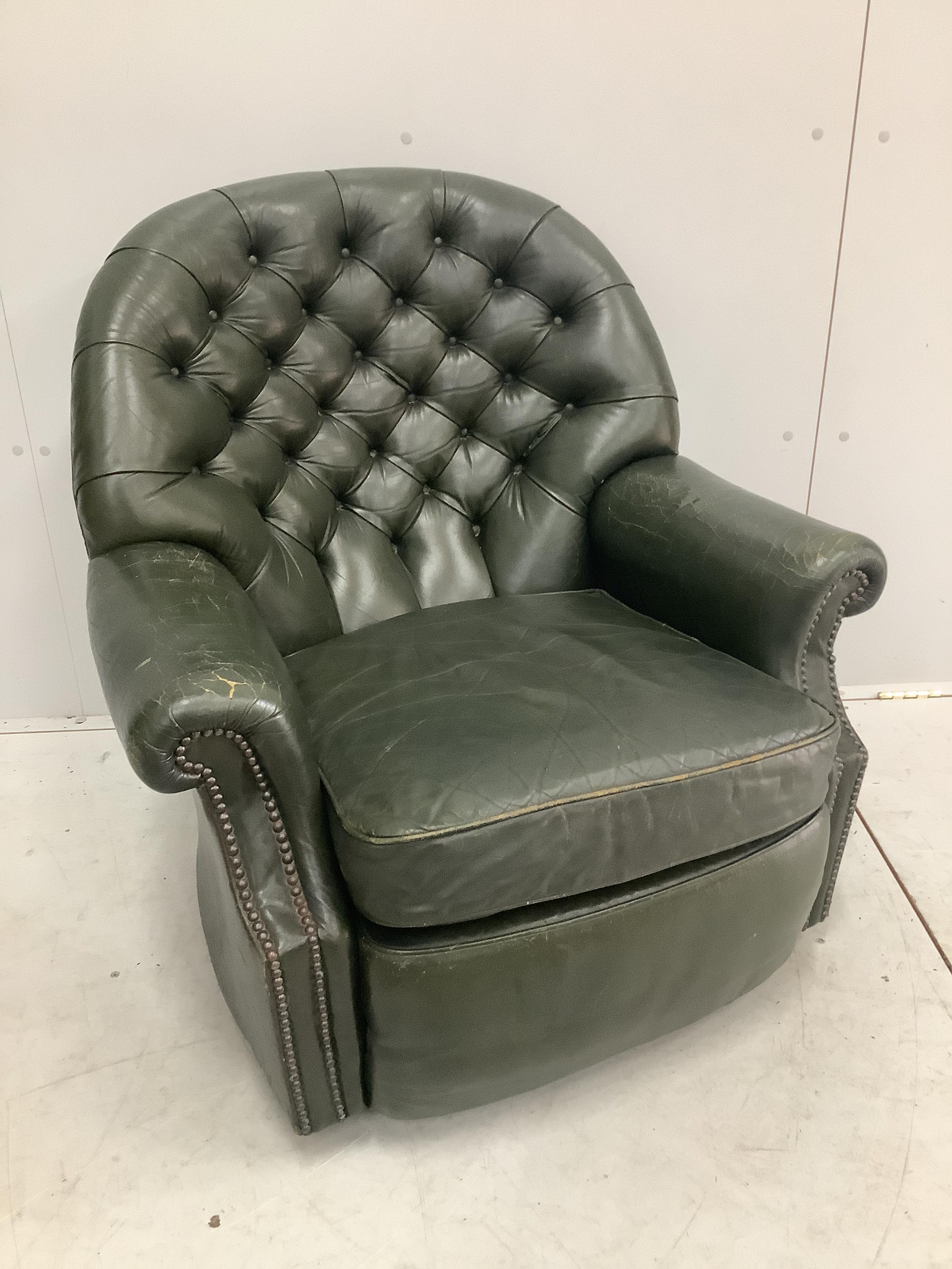 A Pegasus Furniture “Julianna” buttoned green leather club armchair, width 85cm, depth 70cm, height 88cm